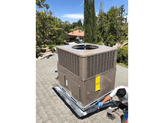 Air conditioner unit on a roof.