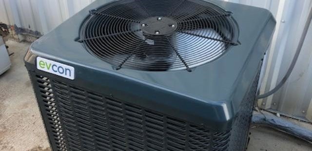 A fan on the top of a machine in black